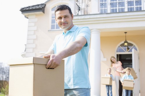 Professional movers loading items for removals and storage in Eastham
